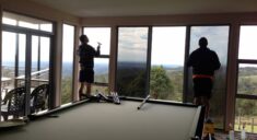 technicians applying window film - window tinting gold coast