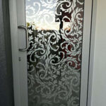 decorative window tinting on a glass door