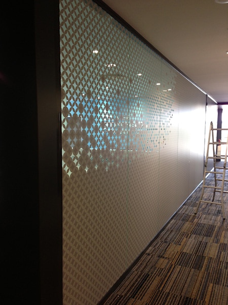 Decorative window film installed on a glass wall of an office in the Gold Coast